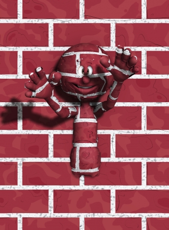 Cartoon figure coming out of a brick wall の写真素材
