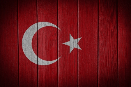 Turkey flag painted on old wood plank backgroundの写真素材