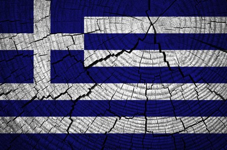 Greece Flag painted on old wood backgroundの写真素材