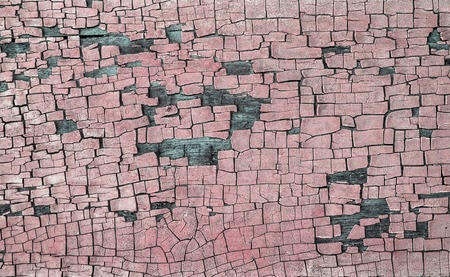 cracked paint on wooden surfaceの写真素材