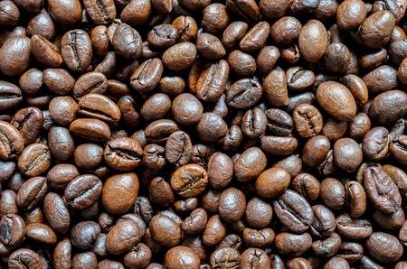 Coffee beans in the backgroundの写真素材