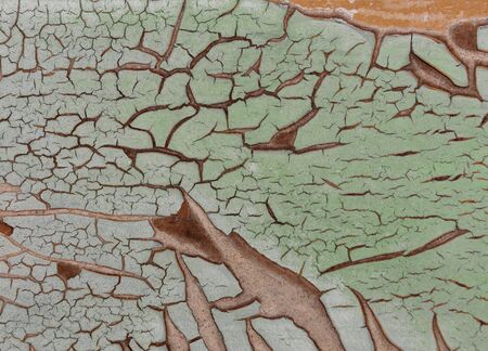 Cracked paint on wooden background, texture. Vintage wallpaperの写真素材
