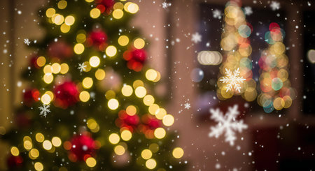 Festive Christmas trees with warm glowing lights and soft falling snow for holiday cheerの素材