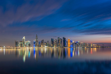 The Panoramic skyline of Doha, Qatar during sunrise