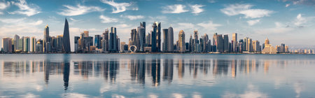 The Panoramic skyline of Doha, Qatar during sunset sunrise