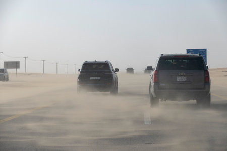 Sand storm in desert road Saudi Arabiaのeditorial素材