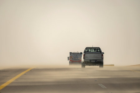 Sand storm in desert road Saudi Arabiaのeditorial素材