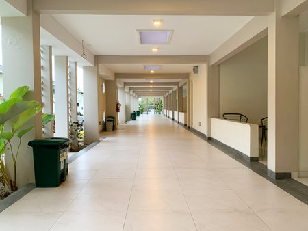 Interior of a modern corridor with walkways and columns.の写真素材