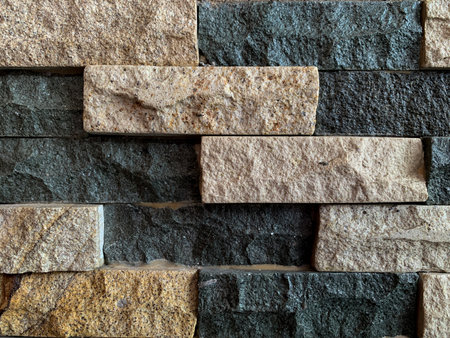 Background of stone wall texture. Natural stone wall texture for interior or exterior design.の写真素材