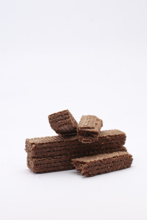 chocolate wafers on white background, closeup of photoの写真素材