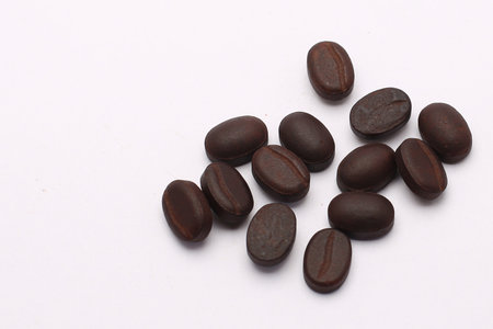 Coffee beans isolated on a white background. Close up.の写真素材