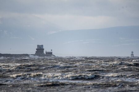 A view of ocean waves because of the strong wind.   Iona island Richmond BC Canada