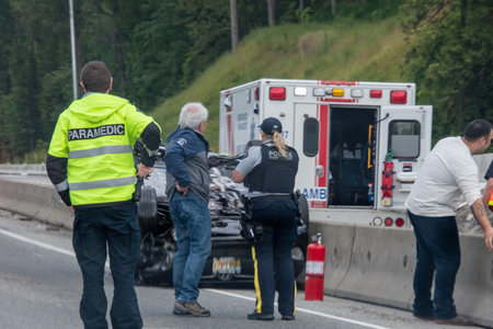 A picture of a car that flipped over an accident on the Trans Canada highway, North bound.    June 6th 2020 North Vancouver BC Canadaのeditorial素材