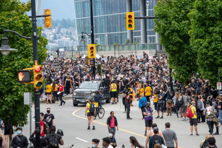 A large gathering of demon simulators partipiping in the Freedom March.   Vancouver BC Canada June...