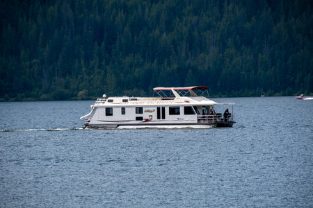 Houseboat cruising on Mara lake. BC Canada  July 4th 2020