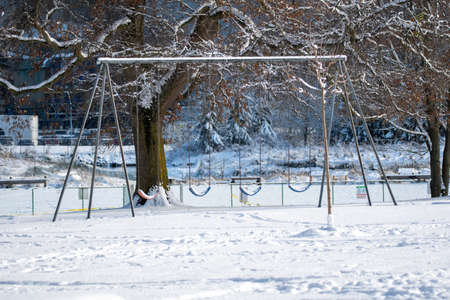 Some Playground Swings Covered in Snow   Vancouver BC Canadaãの写真素材