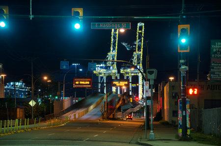 New white cranes working in port of Vancouver.   Vancouver BC Canada  May 1st 2021のeditorial素材