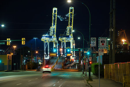 New white cranes working in port of Vancouver.   Vancouver BC Canada  May 1st 2021