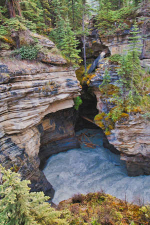 The erodedãspace of Athabasca Falls.   Jasper AB Canadaの写真素材