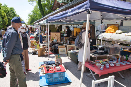 On April 25, 2022, Flea market was held at Kitano Tenmanguu shrine in Kyoto, Japan.  The fair is held on the 25th of each month.のeditorial素材