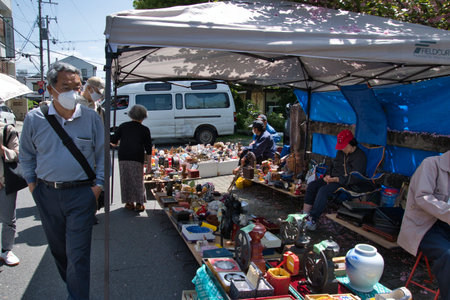 On April 25, 2022, Flea market was held at Kitano Tenmanguu shrine in Kyoto, Japan.  The fair is held on the 25th of each month.のeditorial素材