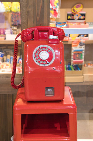 A red vintage payphone setting as display.  Kyoto Japanの写真素材
