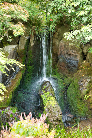 A small waterfall in the garden.    Kyoto Japanの写真素材