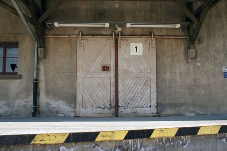 entrance with door handle of an old ware houseの写真素材