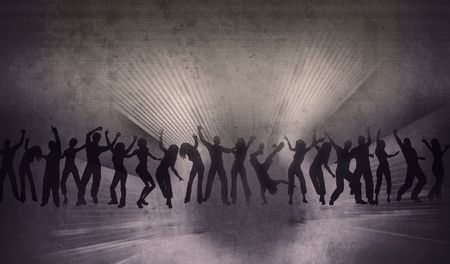 many happy people are dancing on the stageの写真素材