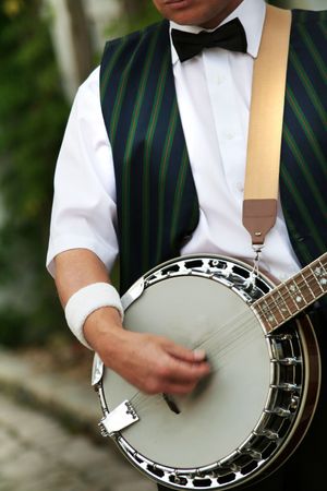 entertained banjo player is doing his jobの写真素材