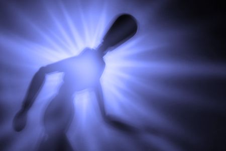 blurry silhouette of a figure in motion の写真素材