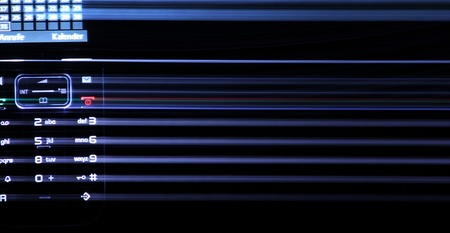 blue keys of the phone in the dark