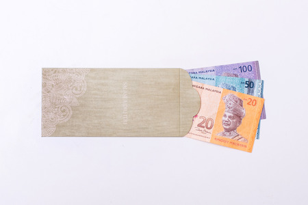 A Money Packet for Ramadan and Aidilfitri Celebration isolated on white background