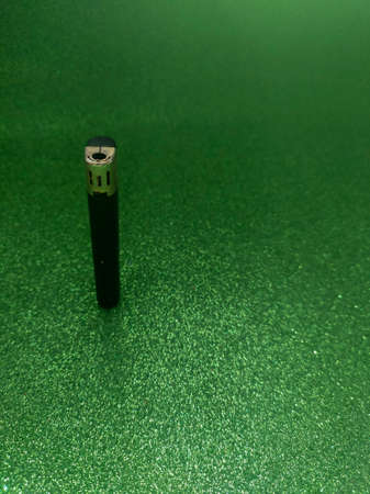 Lighter on Green Sparkle Textureの写真素材