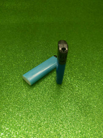 Lighter on Green Sparkle Textureの写真素材