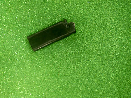 Lighter on Green Sparkle Textureの写真素材