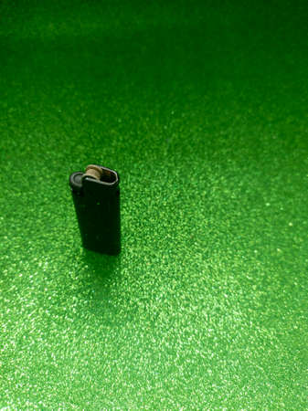 Lighter on Green Sparkle Textureの写真素材