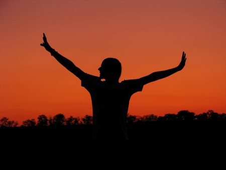 my friend's edgy on the sunset backgroundの写真素材