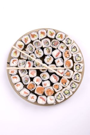 collection of different rolls served on the round plate の写真素材