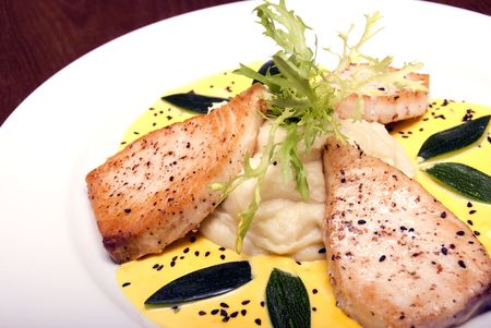 Hot fish dish with sauce