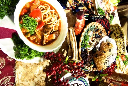 Festive table with different dishes in Asian styleの写真素材