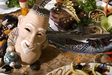 Festive board with different dishes in Asian style の写真素材