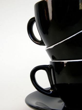 Three black cups isolated on white backgroundの写真素材