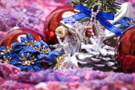 Different Christmas decorations on the soft colorful materialの写真素材
