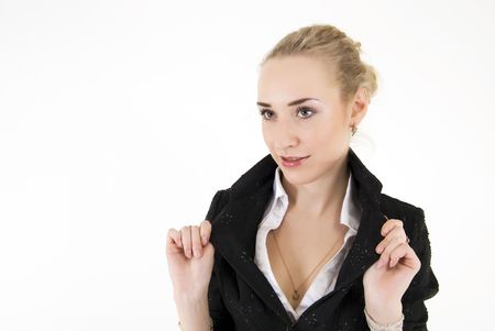 Portrait of a young beautiful blonde in the black jacketの写真素材