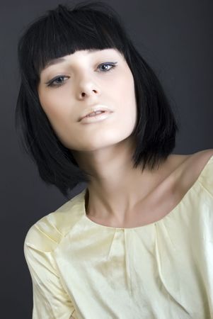 Portrait of a young beautiful  fashionable  brunette の写真素材