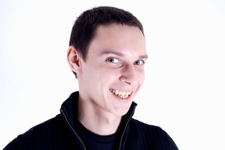 Portrait of a young dark-haired man laughingの写真素材