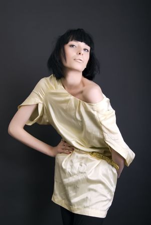 Portrait of a young beautiful fashionable brunette posingの写真素材