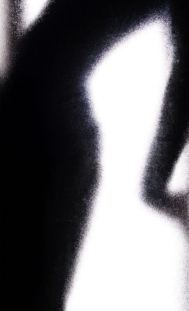 black sihouette behind the glass door movingの写真素材