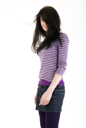 Portrait of a young beautiful brunette isolated on whiteの写真素材